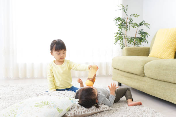 istock Child taking care of sister 874778794