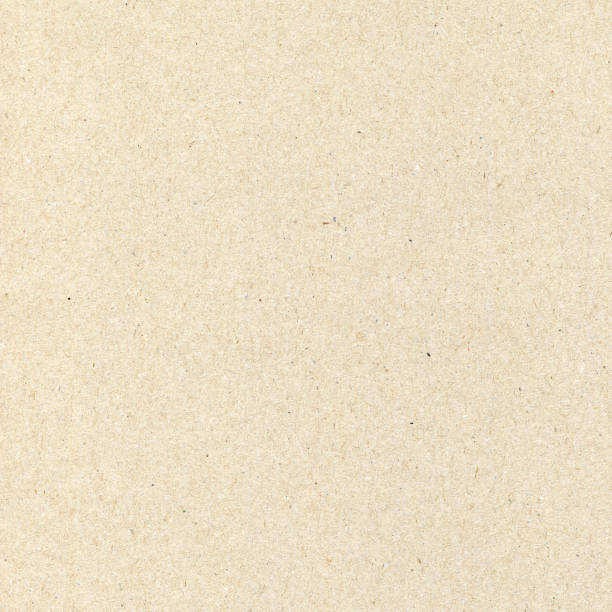 istock Natural decorative recycled paper texture. Beige, yellow space background. 874779274