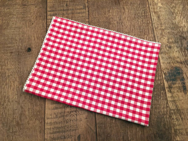 istock Red white napkin on wood 874779818