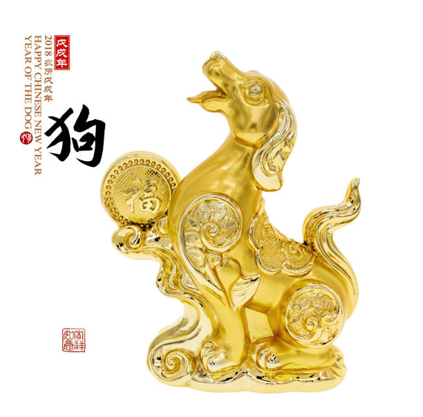 istock golden dog statue on white background 874780088