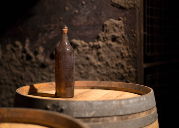 istock Wine cask, a bottle of wine, cellar 874784376