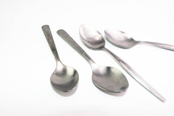 istock The silver stainless steel of long spoon in each pattern handle 874784840