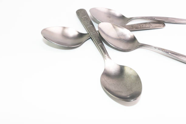 istock The silver stainless steel of long spoon in each pattern handle 874787570