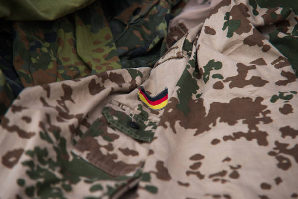 istock Close up on German flag on military uniform 874787594