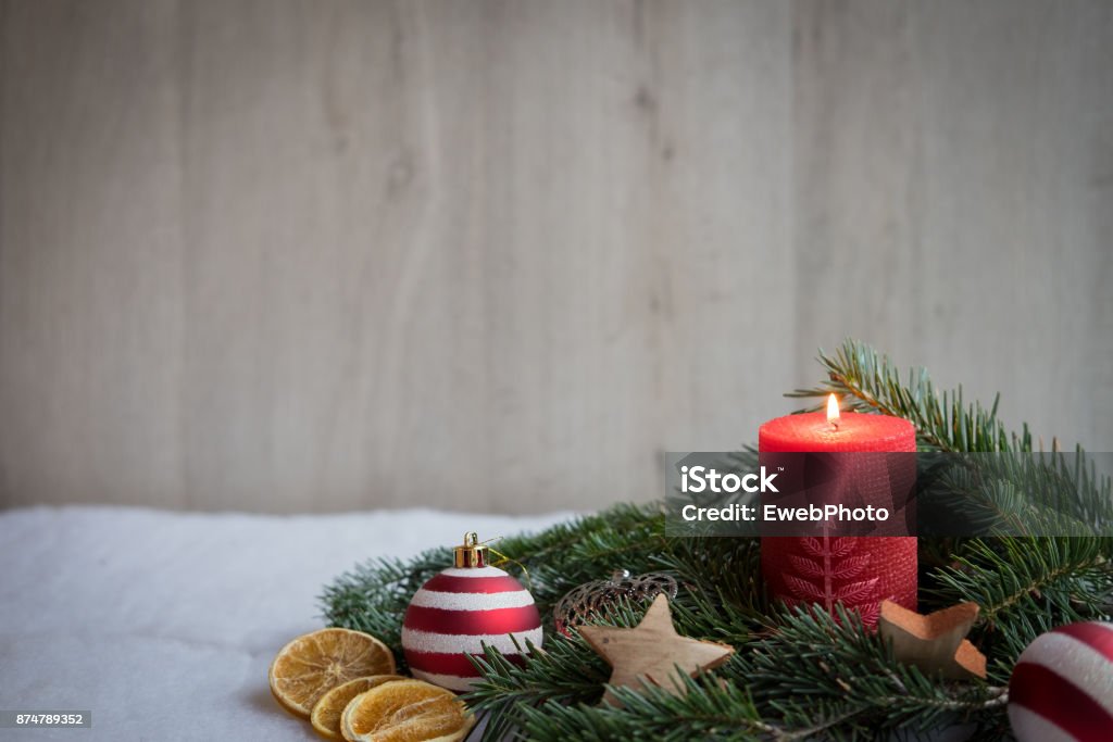 Christmas ornaments with snow, pine tree and candles Advent Stock Photo