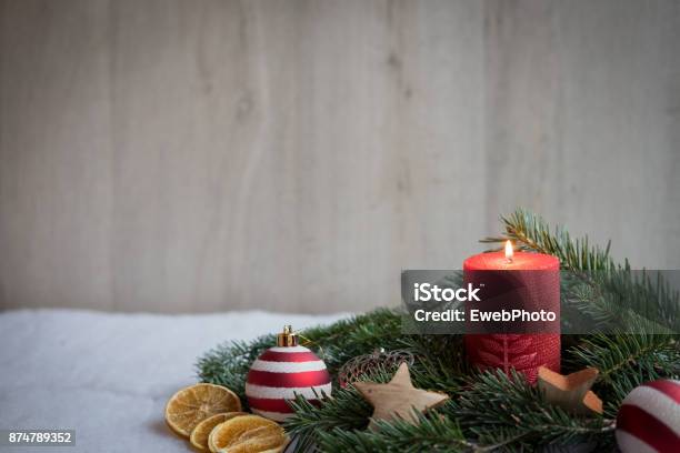 Christmas Ornaments With Snow Pine Tree And Candles Stock Photo - Download Image Now