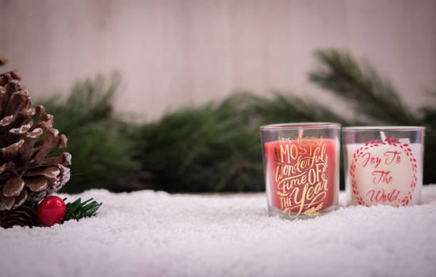 istock Christmas ornaments with snow, pine tree and candle 874789466
