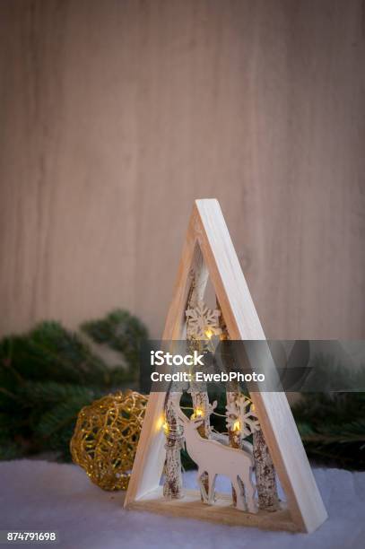 Christmas Ornaments And Xmas Lights With Snow Pine Tree And Cone Stock Photo - Download Image Now