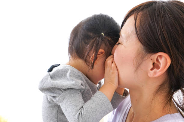 istock Mother and child 874792448