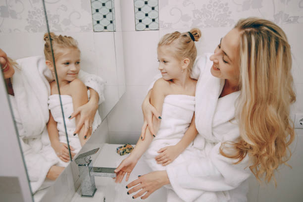 istock family in the bathroom 874793018