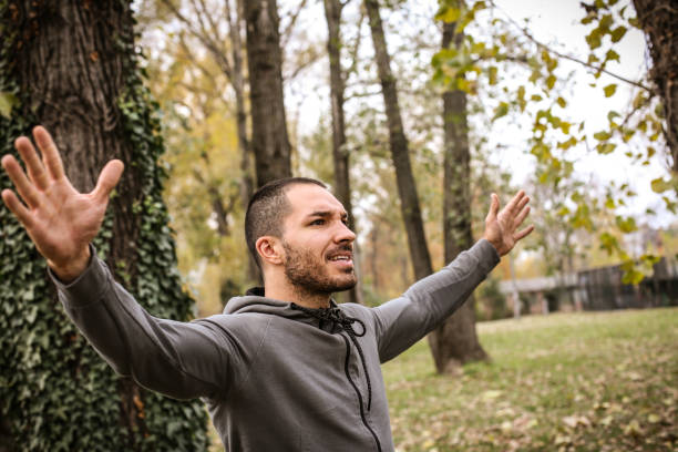 istock Sporty man with arms outstretched. 874793276
