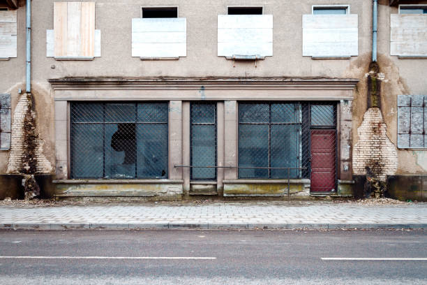 istock Entrance to abandoned shop 874793734