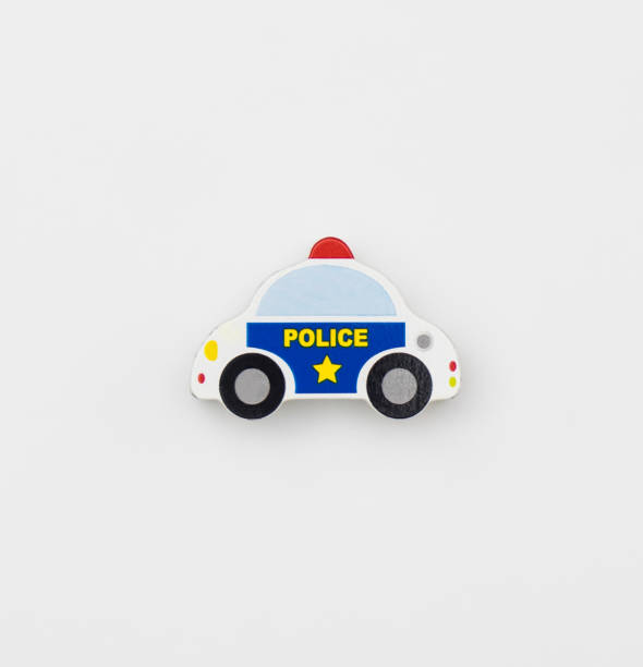 istock Police toy block car isolated on white 874794346