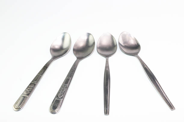 istock The silver stainless steel of long spoon in each pattern handle 874799642