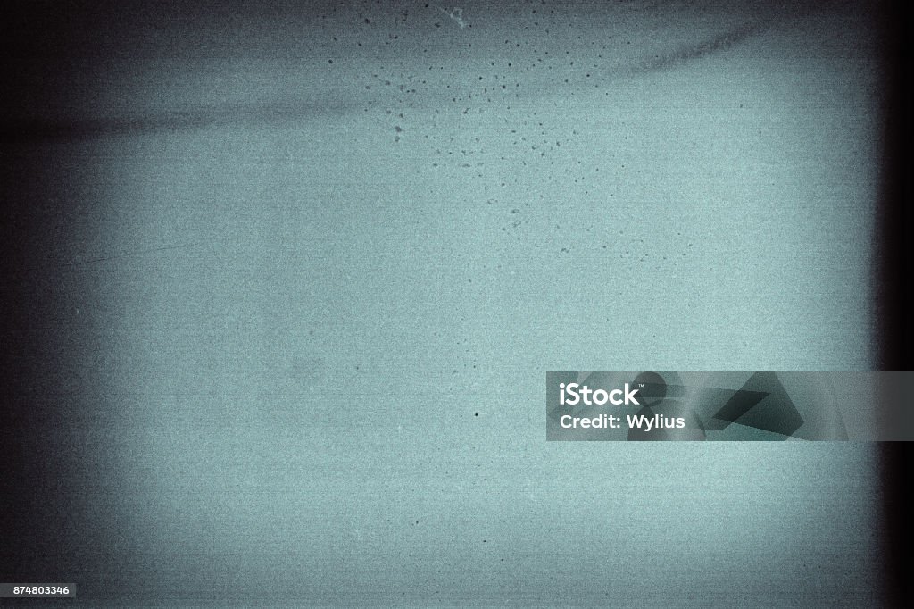 Old grunge filmstrip Blank grained film strip texture background with heavy grain and dust Movie Stock Photo