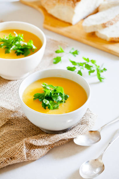 istock Two Bowls Of Pumpkin Soup 874804976