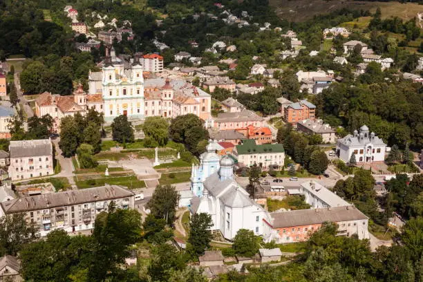 Photo of Top aerial city landscape close up view. Kremenets, Ukraine. Old buildings with peeling paint