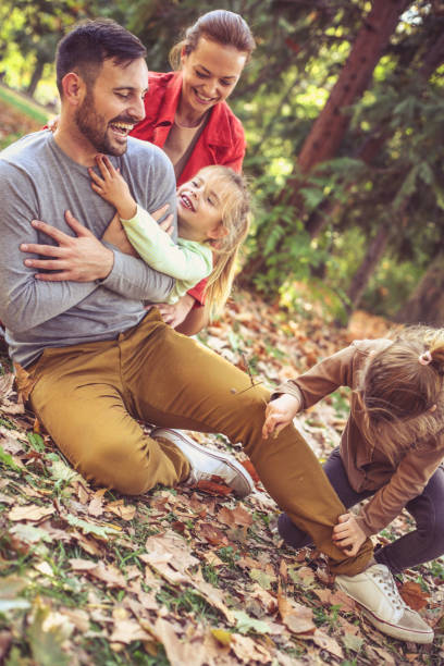 istock Family spending time together, tickling father is fun. 874811146