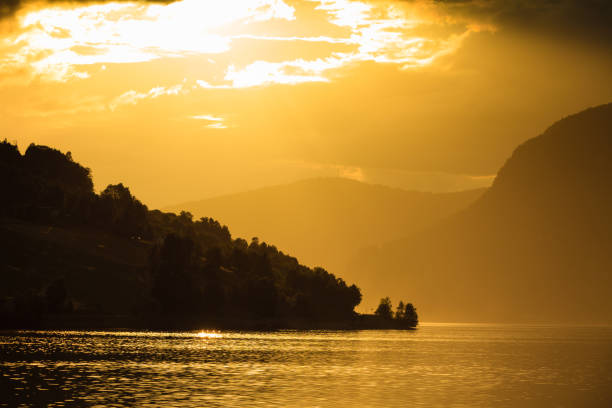 istock Red sunset over sea fjord Norway 874814354