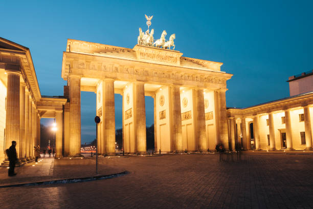 istock Brandenburg Gate illuminated at night, Berlin, Gemany 874818590