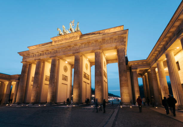istock Brandenburg Gate illuminated at night, Berlin, Gemany 874818724