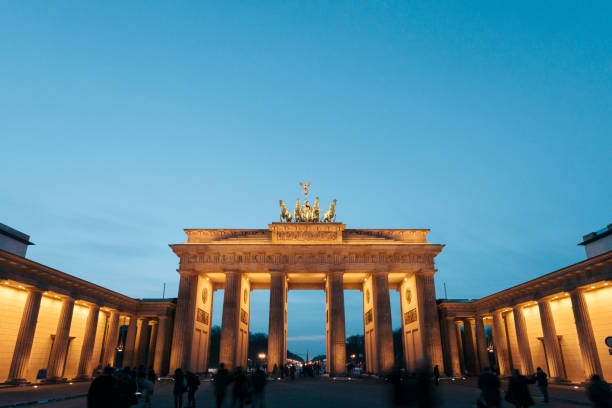 istock Brandenburg Gate illuminated at night, Berlin, Gemany 874818780