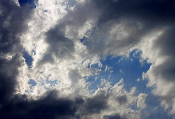 istock Blue sky and white clouds and the sun 874822464