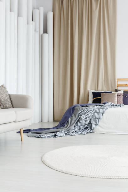 istock Sophisticated interior with gold curtain 874822482