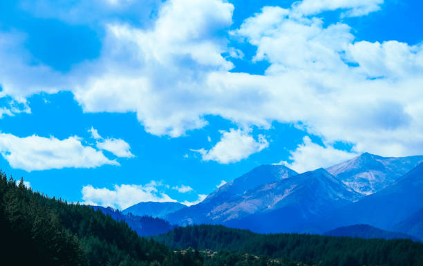 istock Beautiful view on the high snow mountains peaks, on the blue sky background. 874822916