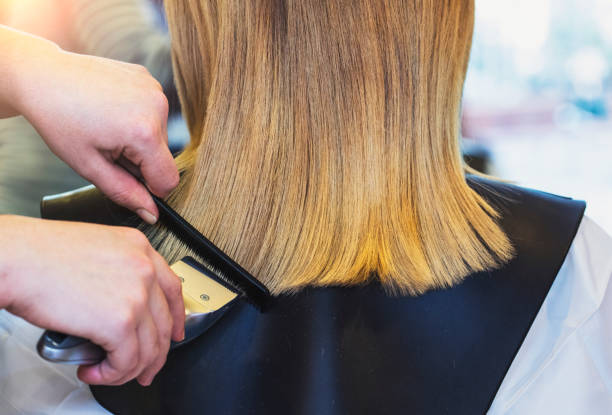istock Haircut using the Electric Razor Clipper Hair Cutter 874827510