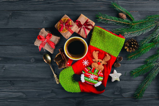 istock Christmas background with fir tree, hot chocolate and marshmallow. Top view with copy space 874829198