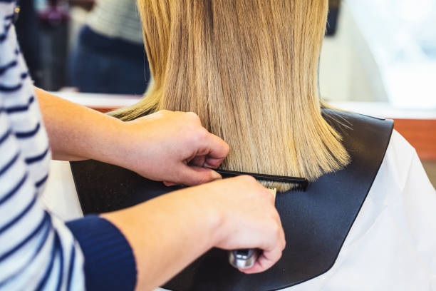 istock Haircut using the Electric Razor Clipper Hair Cutter 874829234