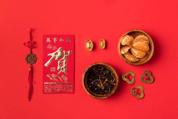 istock chinese decorations and tangerines 874833350