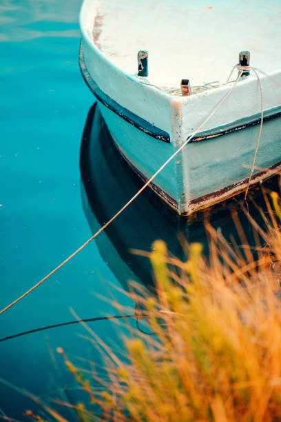 istock Lonely fishing boat 874836624