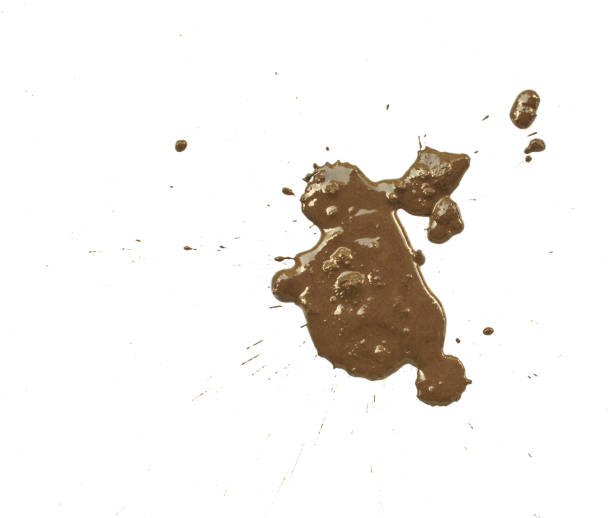 istock Drops of mud splashes on a white backgrounds 874837308