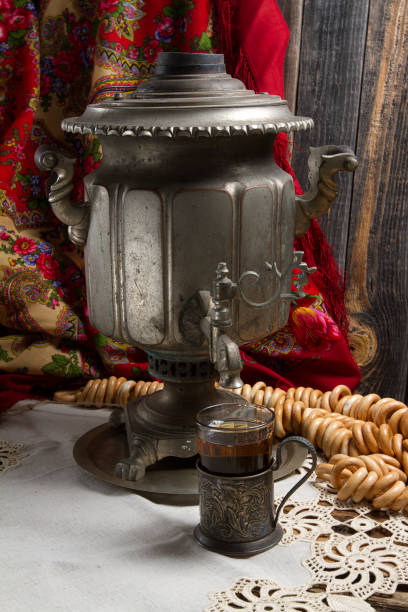 istock Russian traditional tea-drinking: a samovar, drying and tea in cup holder 874841476