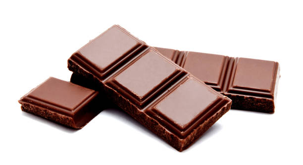 istock Dark milk whole chocolate isolated on a white 874848112