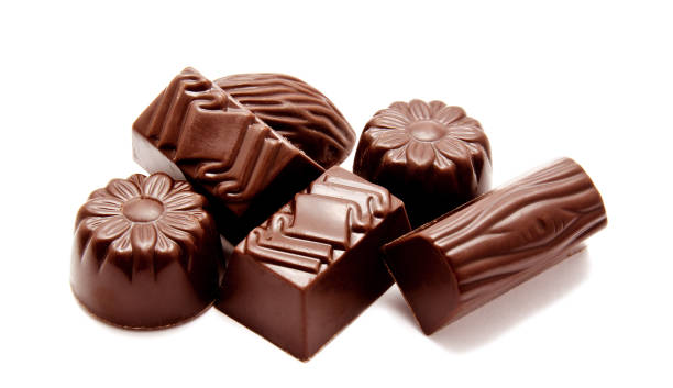 istock Dark milk whole chocolate isolated on a white 874848248