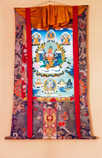 buddhist thangka - a tibetan buddhist painting on cotton, or silk applique - in a monastery in gangtok, sikkim, india - tanka imagens e fotografias de stock