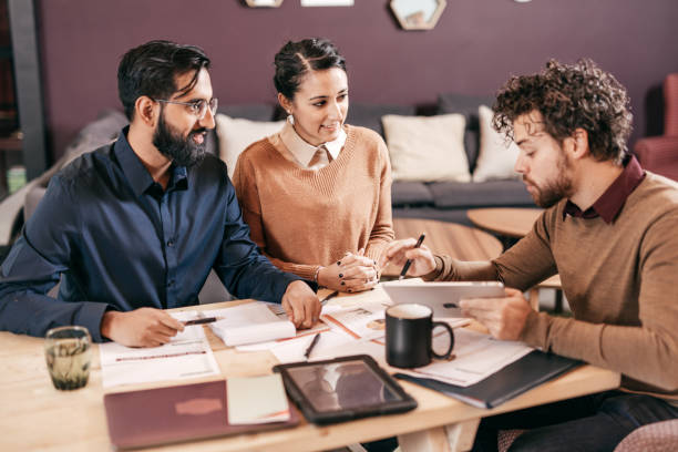 istock Couple and financial advisor 874852242