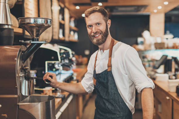 istock Cheerful male barista 874863572