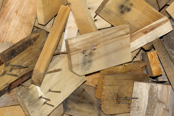 istock piece of wood with nails as background 874866570