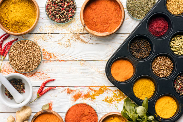 istock scattered spices and glasses with spices 874868542