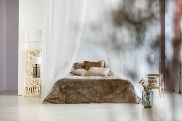 istock Brown pillows and fur coverlet 874871014