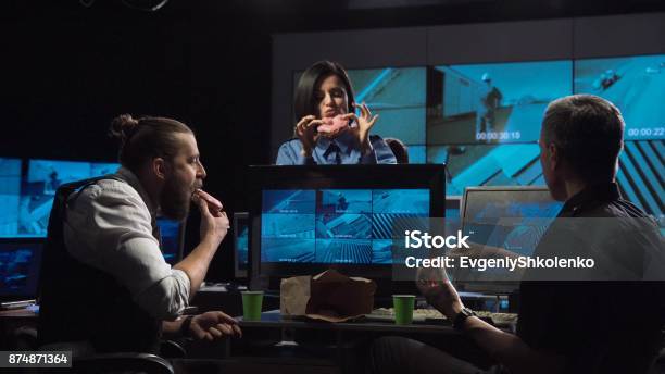 Security Guards Watching The Surveillance Cameras Stock Photo - Download Image Now - Eating, Security Camera, Computer Monitor