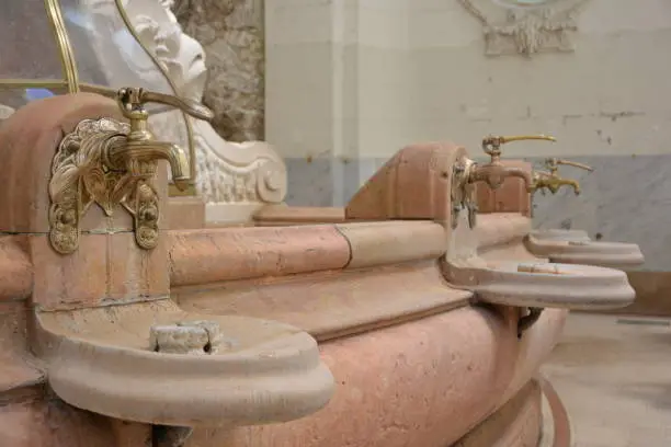 Photo of Vintage faucet with a source of mineral water