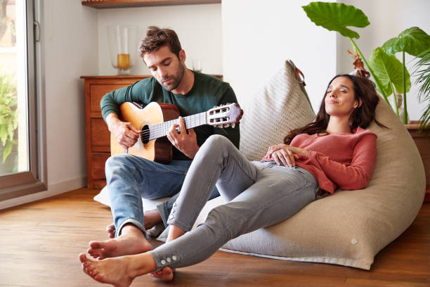 istock She loves his music 874872570