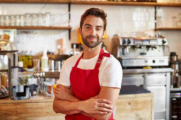 istock I'm ready to serve my first customer for the day 874873174