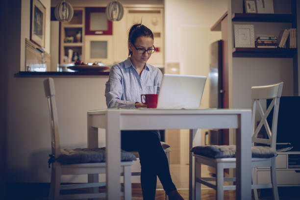 istock Busy lady working at home 874874830