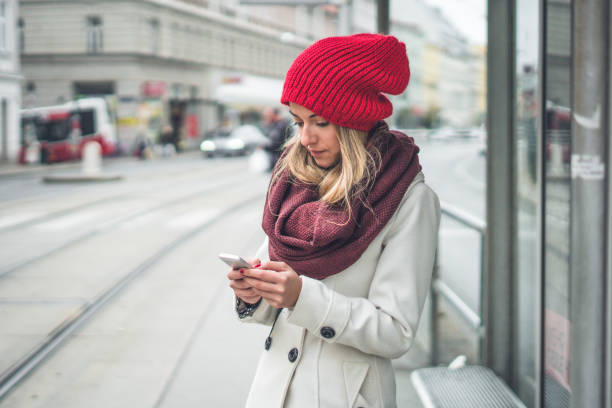 istock Woman texting in the city 874874968